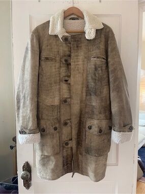 Distressed shearling coat